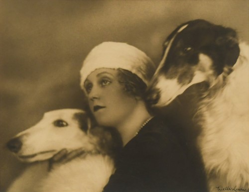 Lot 236 - Weller Lewis (American, late 19th/early 20th century), a 1920s photographic print of a woman and two borzois