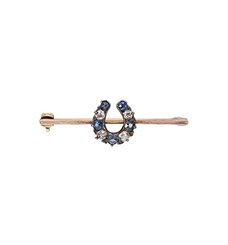 Lot 18 - A Victorian sapphire and diamond horseshoe brooch
