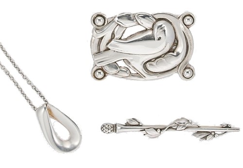 Lot 4 - Georg Jensen - A pendant and chain and a brooch, together with one other brooch