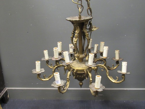 Lot 648 - A similar pair of eight branch gilt metal...