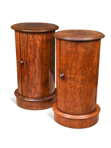 Lot 454 - A near pair of cylindrical mahogany pot cupboards, 19th century