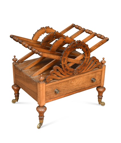 Lot 396 - A Victorian walnut canterbury