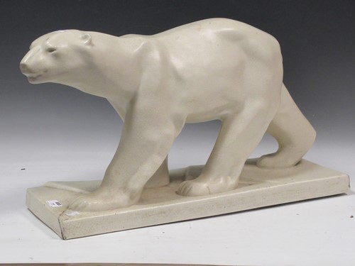 Lot 77 - A French Orchies pottery model of a polar bear...