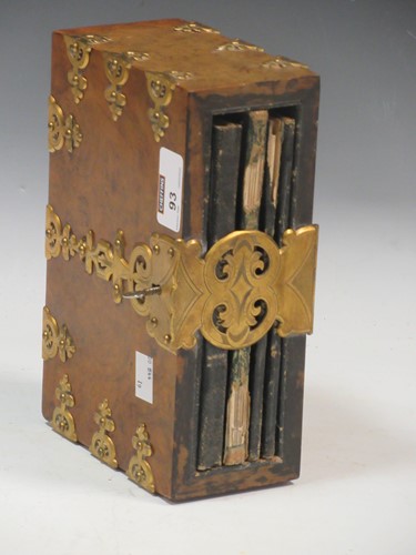 Lot 93 - A Victorian walnut and brass bound desk top...