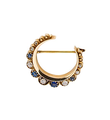 Lot 20 - A Victorian sapphire and diamond crescent brooch
