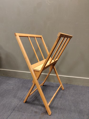Lot 726 - An elm folio stand, 59cm wide