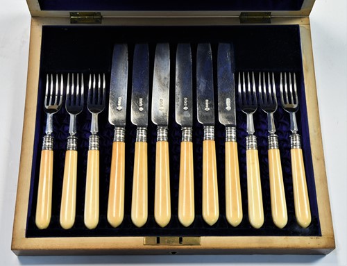 Lot 506 - A cased set of six pairs of Victorian silver fruit eaters