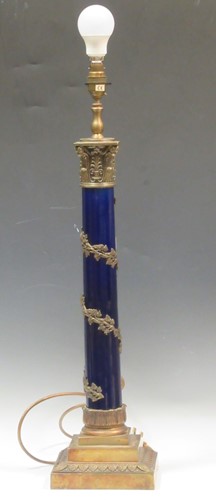Lot 50 - A metal mounted and blue enamel column lamp...