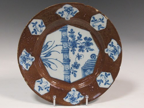Lot 39 - A Bristol or Wincanton Delft plate with powder...