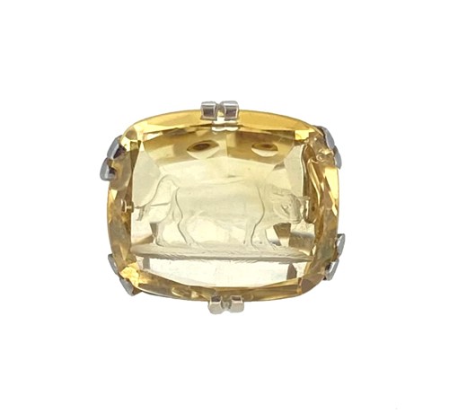 Lot 57 - A citrine intaglio ring