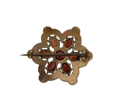 Lot 46 - A trio of garnet set jewels