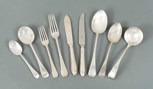 Lot 546 - A 104-piece set of George V silver cutlery and flatware with 50 additions