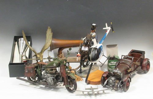 Lot 173 - A painted resin figure of a mounted lancer...
