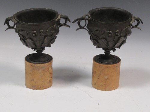 Lot 25 - A pair of late 19th century bronze vessels...