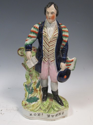 Lot 124 - A Staffordshire ceramic standing figure of...