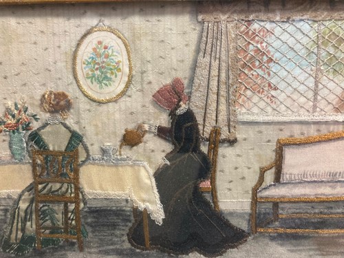 Lot 581 - A needlework picture of two ladies in early...