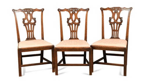 Lot 590 - A set of three fruitwood dining chairs, 18th century