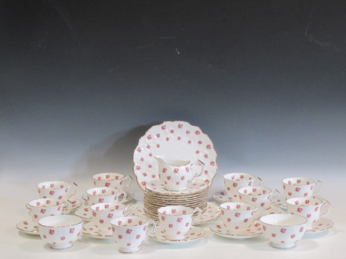 Lot 65 - An Aynsley Rosedale pattern tea service...