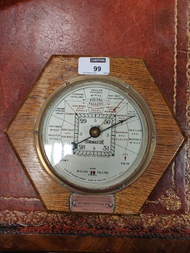 Lot 99 - An early 19th century wheel barometer,...