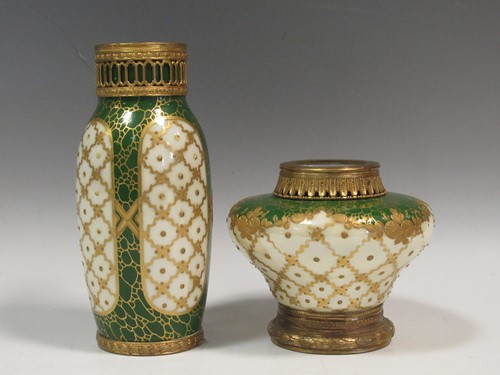 Lot 37 - Two small gilt metal mounted Sevres style vases