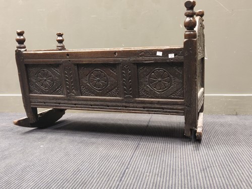 Lot 698 - A late 17th / early 18th century carved oak...