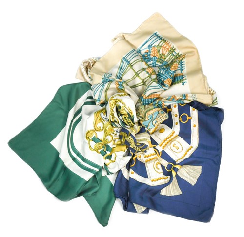 Lot 173 - A collection of three Hermès silk scarves