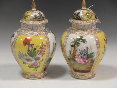 Lot 28 - A pair of Helena Wolfson vases and covers