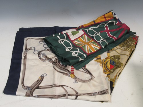Lot 77 - A collection of seven silk scarves including...