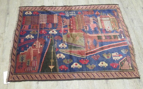 Lot 798 - A Beluchi style rug 137 x 96cm