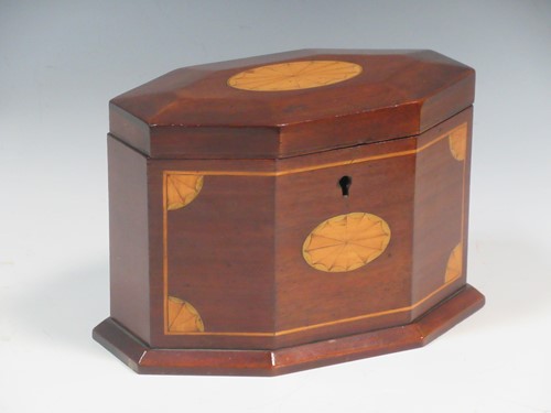 Lot 101 - A George III tea caddy, of shaped octagonal...