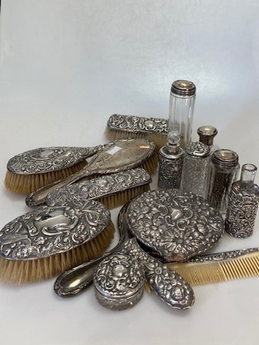 Lot 192 - A collection of silver backed dressing...