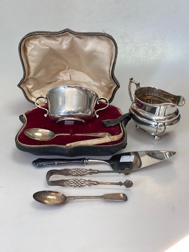Lot 188 - A cased silver spoon and two handled bowl,...