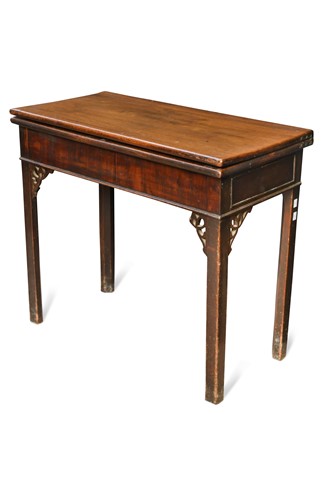 Lot 621 - A George III mahogany fold over tea table
