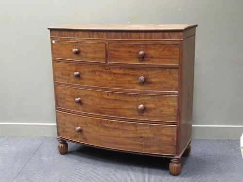 Lot 438 - A Victorian bow fronted chest of drawers, with...