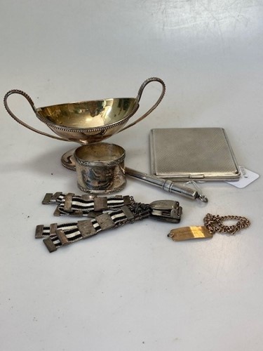 Lot 184 - An identity bracelet, links stamped '9.375',...