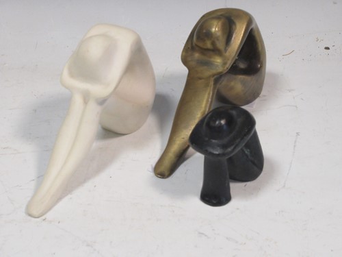 Lot 135 - A Modernist small bronze of a stylised figure...
