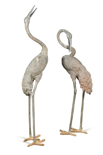 Lot 664 - A pair of cast bronze cranes, 20th century