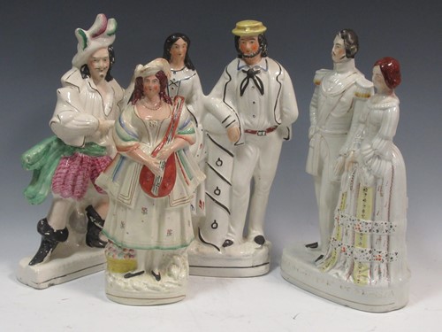 Lot 120 - A collection of Staffordshire flat back...