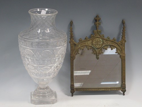 Lot 90 - A small Gothic style gilt metal frame mirror...