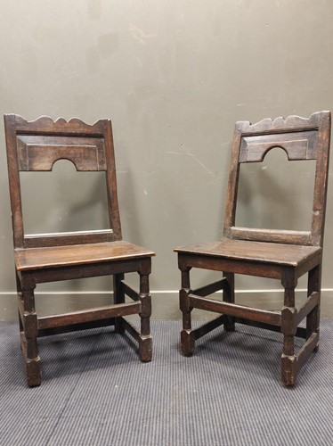 Lot 549 - A pair of 18th century oak chairs