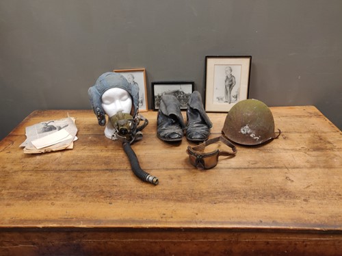 Lot 151 - A WWI military helmet, together with flying...