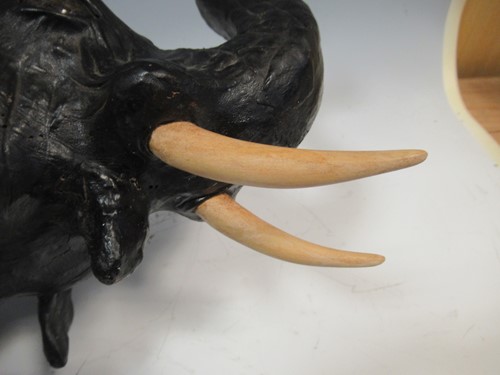 Lot 28 - A leather model of an elephant 48 x 56 x 29cm