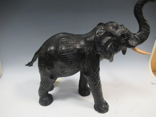 Lot 28 - A leather model of an elephant 48 x 56 x 29cm