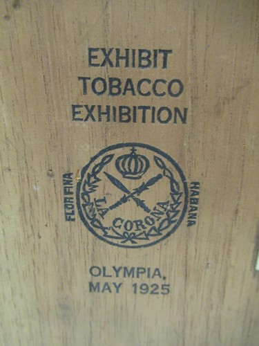 Lot 43 - A small pine tobacco cupboard, branded inside...