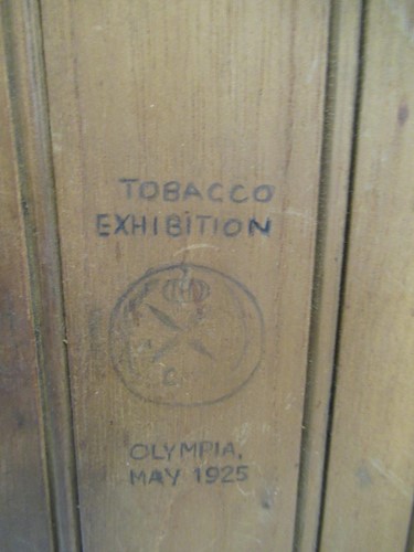 Lot 43 - A small pine tobacco cupboard, branded inside...