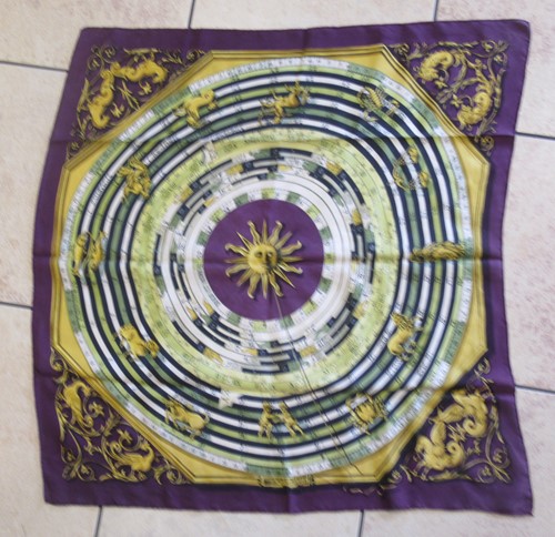 Lot 76 - A Hermes Signs of the Zodiac silk scarf