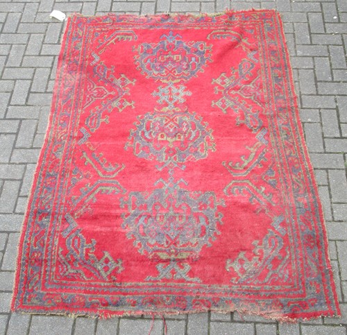 Lot 723 - A red 'Turkey' rug 196 x 144cm