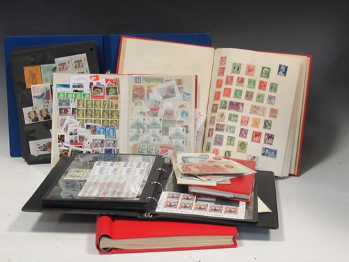 Lot 138 - A collection of stamps, mostly in albums