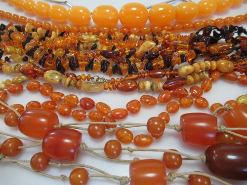Lot 251 - A collecion of amber necklaces