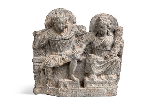 Lot 47 - A Gandharan grey schist figure group, 2nd-4th century